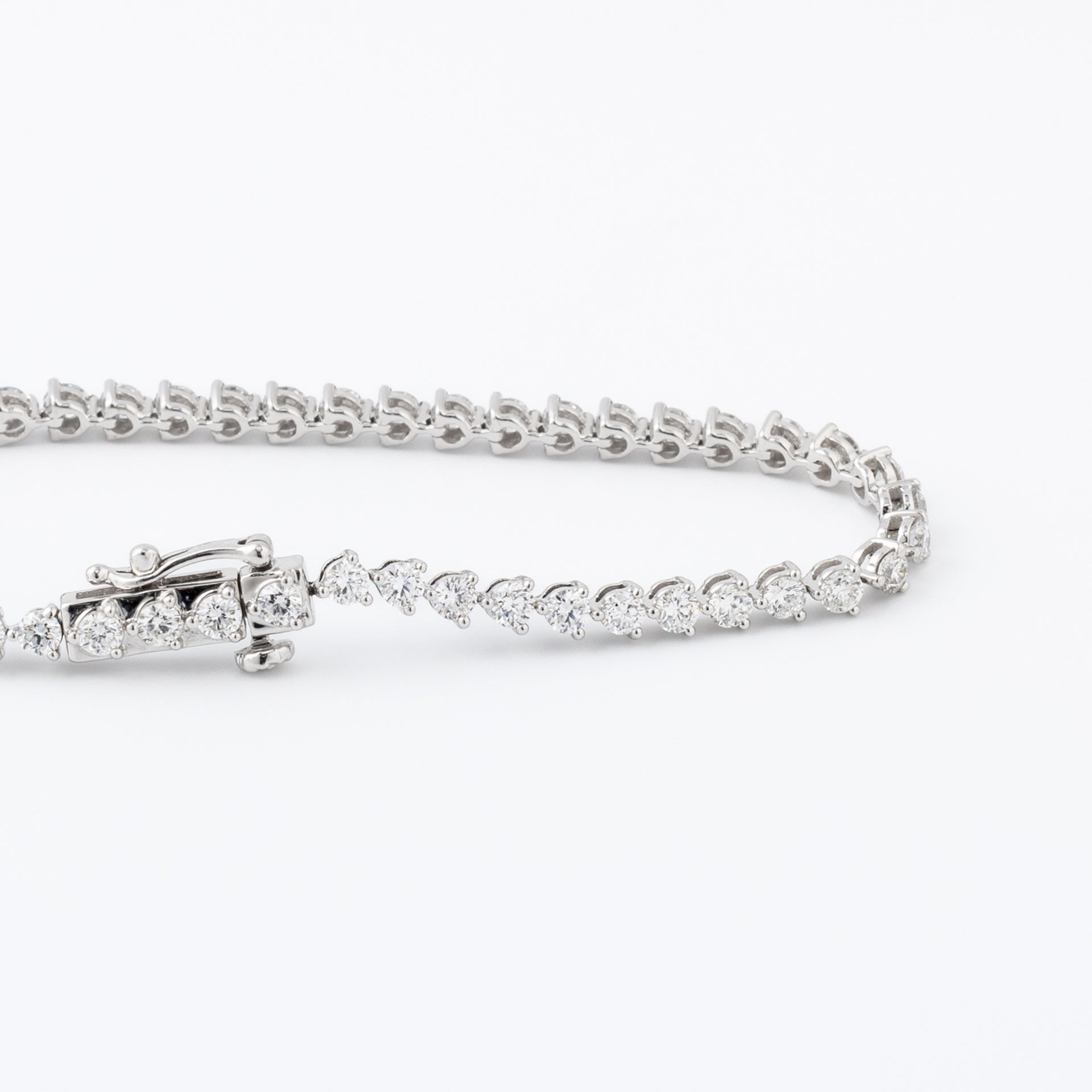 Three-Prong Round Diamond Tennis Bracelet