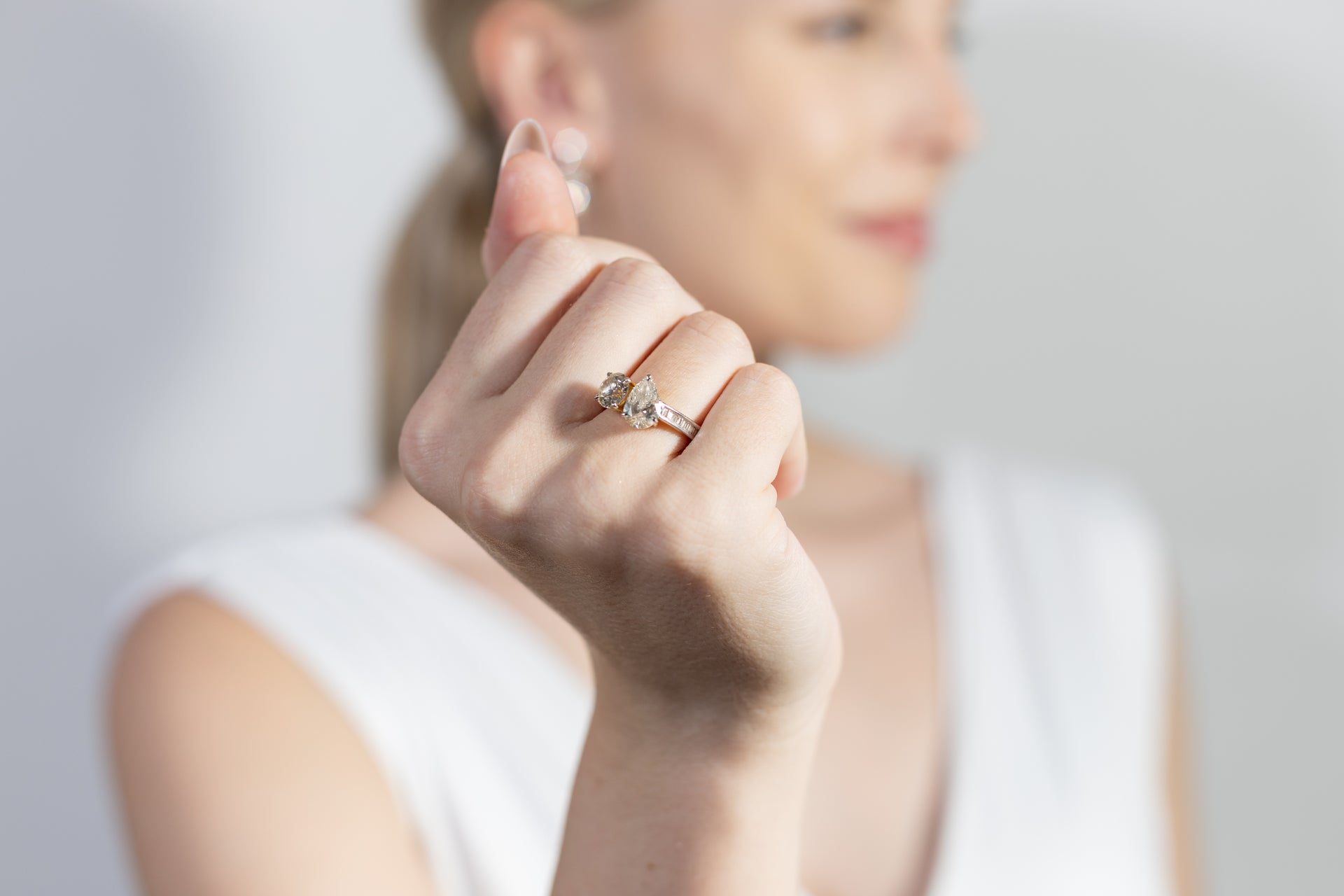 Solitaire Toi Et Moi Pear and Round Engagement Ring